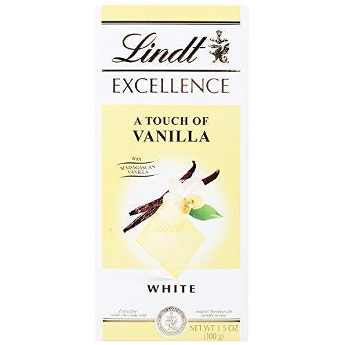 Lindt Excellence White Chocolate Bar, A Touch of Madagascar Vanilla, 100 Grams Free Silver Plated Coin