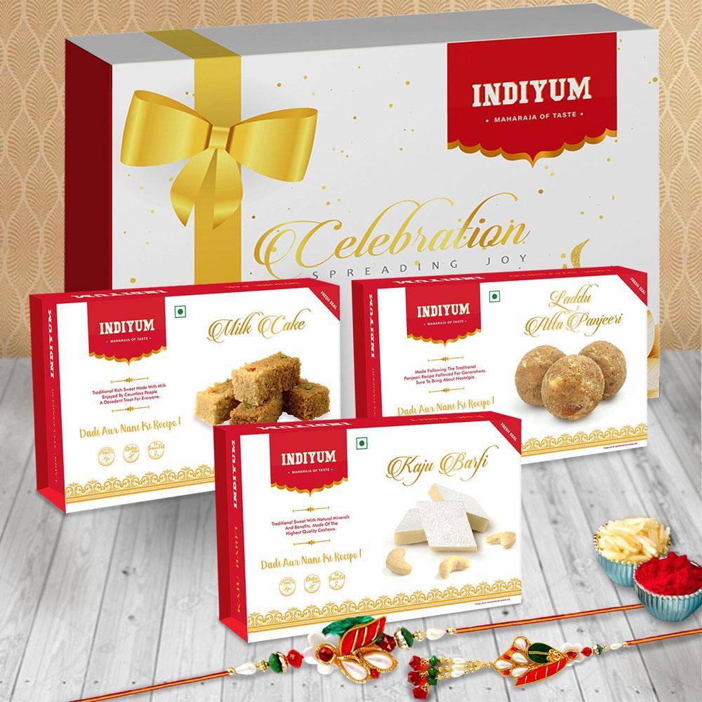 Indiyum Sweet Combo Rakhi Hamper For Bhaiya Bhabhi - Kaju Barfi 200g Atta Panjeeri Laddu 200g Milk Cake 200g Rakhi For Bhaiya Bhabhi Roli Chawal