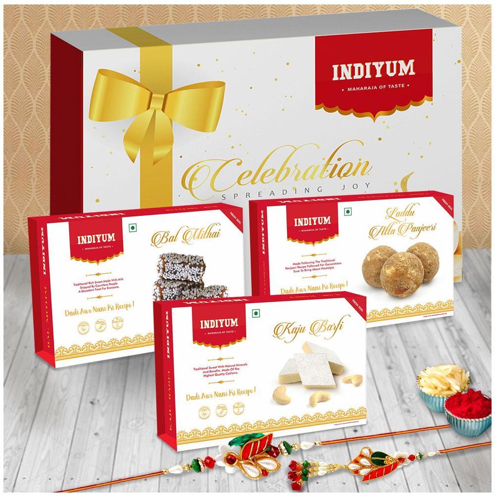 Indiyum Sweet Combo Rakhi Hamper For Bhaiya Bhabhi - Kaju Barfi 200g Atta Panjeeri Laddu 200g Bal Mitahi 200g Rakhi For Bhaiya Bhabhi Roli Chawal