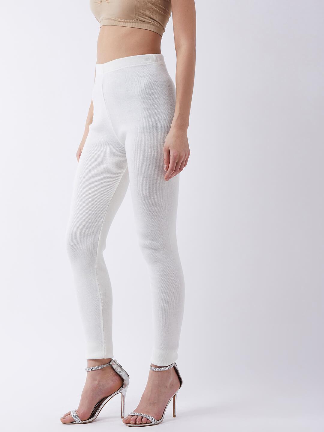 Women Off White solid slim fit woolen leggings