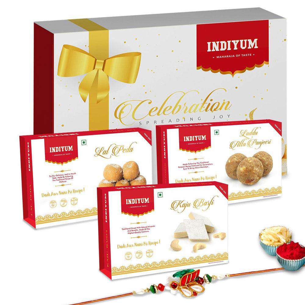 Indiyum  Sweet Combo Rakhi Hamper For Bhaiya - Kaju Barfi 200g Atta Panjeeri Laddu 200g Lal Peda 200g Rakhi For Brother Roli Chawal
