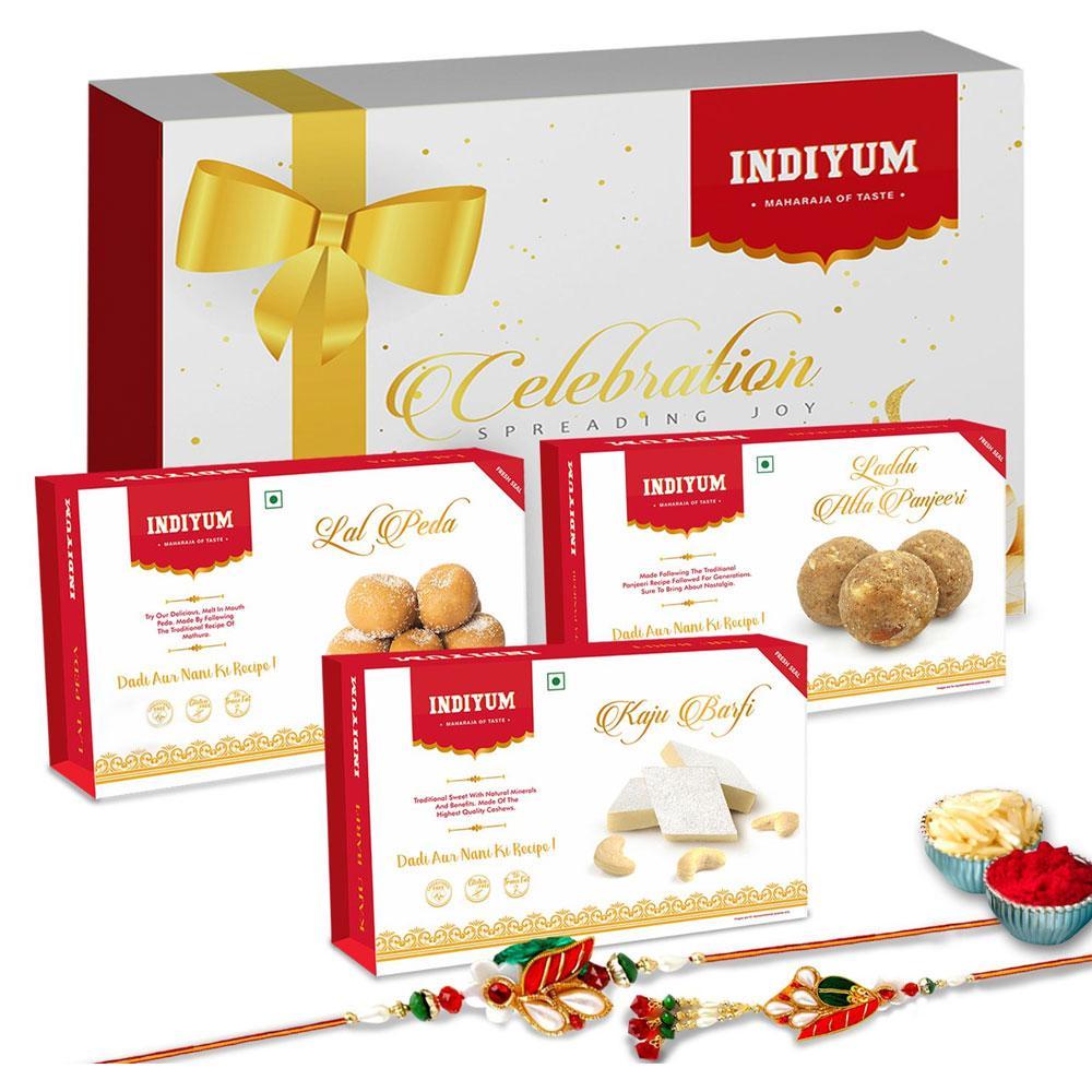 Indiyum Sweet Combo Rakhi Hamper For Bhaiya Bhabhi - Kaju Barfi 200g Atta Panjeeri Laddu 200g Lal Peda 200g Rakhi For Bhaiya Bhabhi Roli Chawal