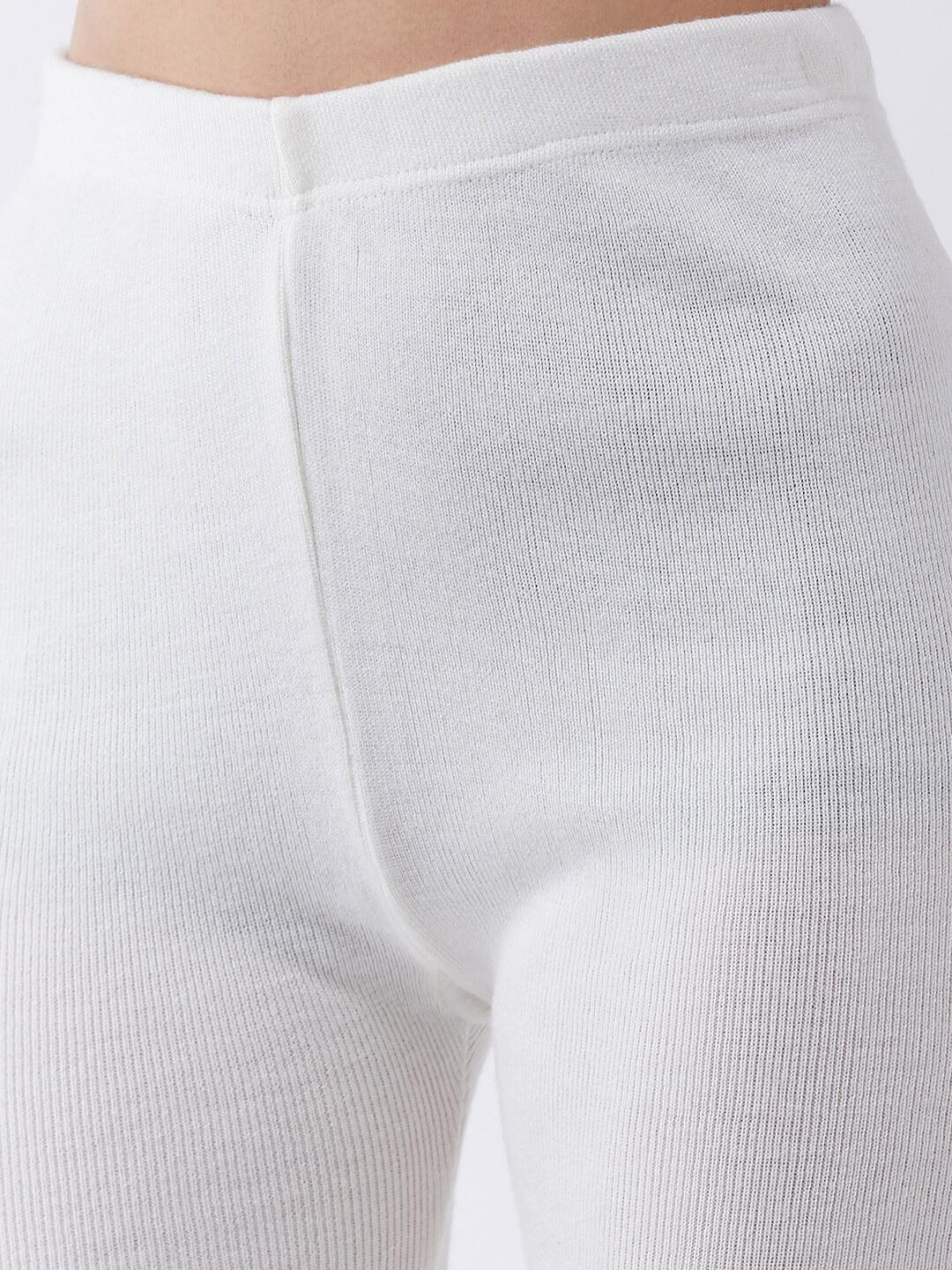 Women Off White solid slim fit woolen leggings