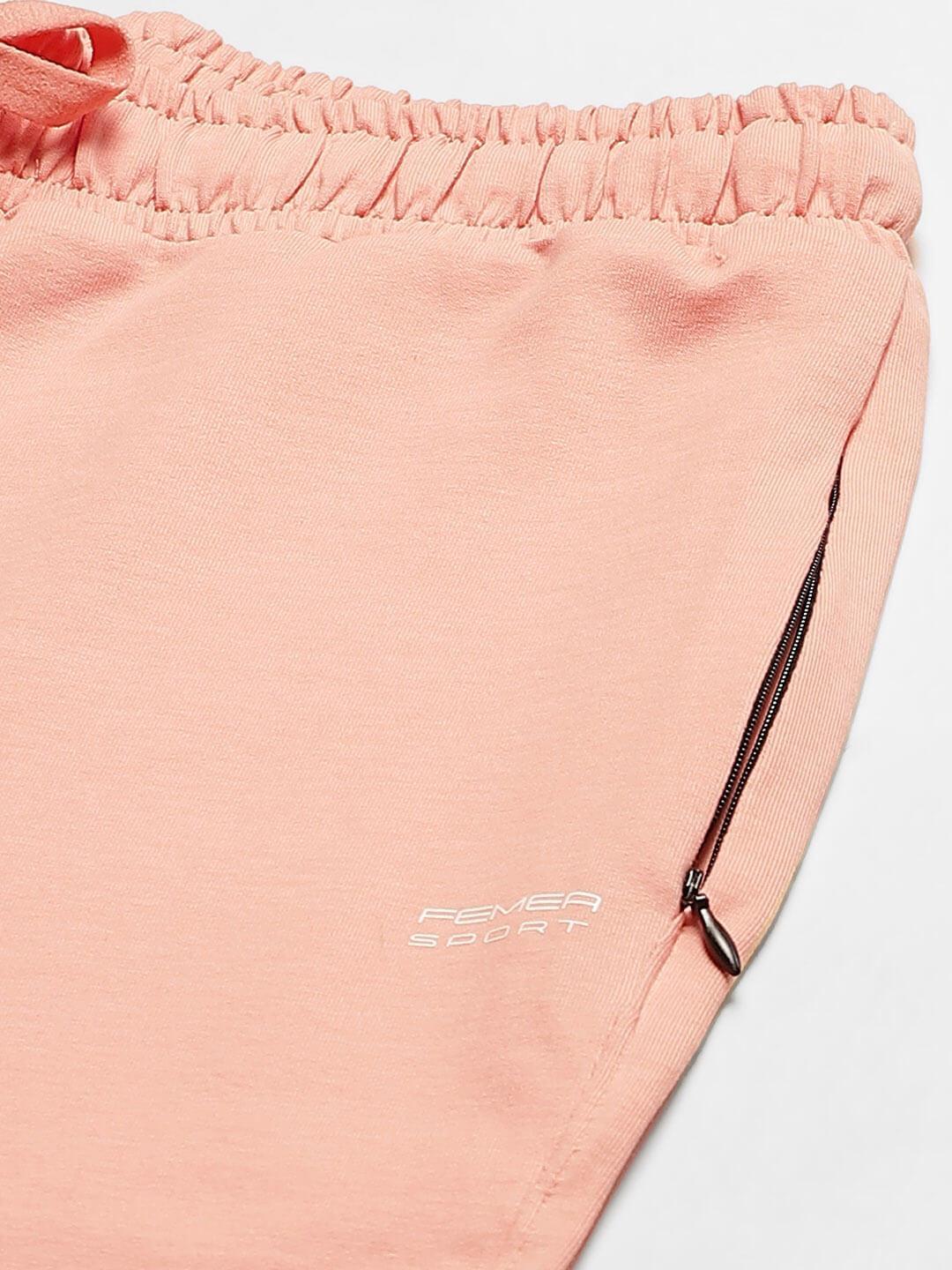Women Peach Solid Boot Cut Fit Track Pants